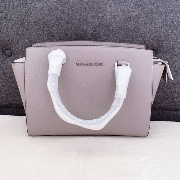 Michael Kors Handbags - NWT Michael Kors SELMA bag pearl gray